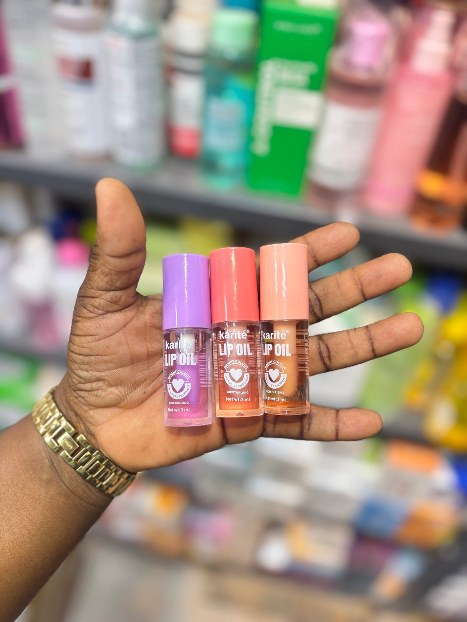 img_5028-scaled-1.jpeg KARITE LIP OIL HYDRATED LIPS MOISTURIZING & SMOOTHES | same content; different packaging - Image 1